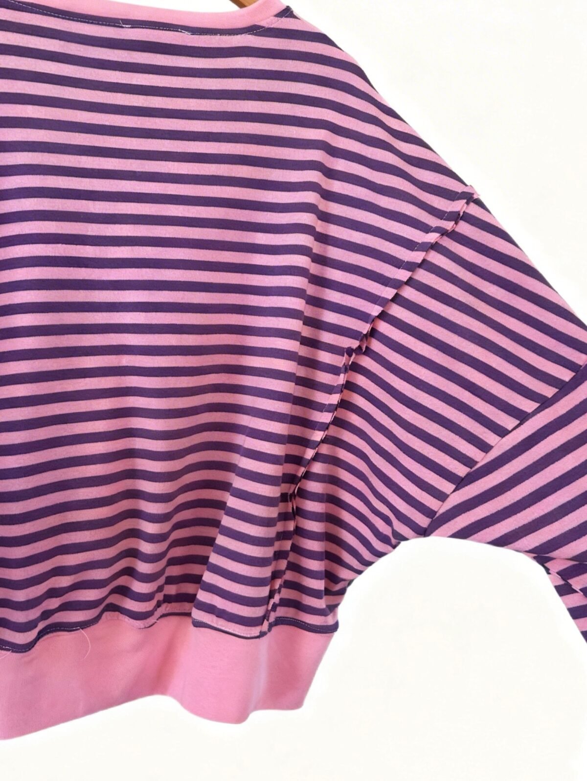 SUDADERA COMBINADA ROSA Y MORADO