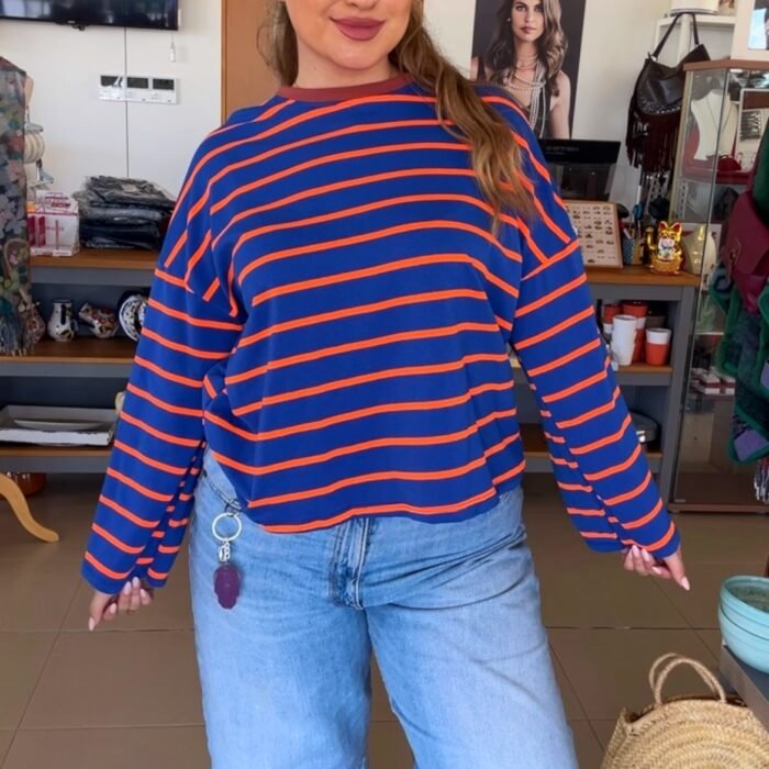 CAMISETA RRAYAS AZUL Y NARANJA