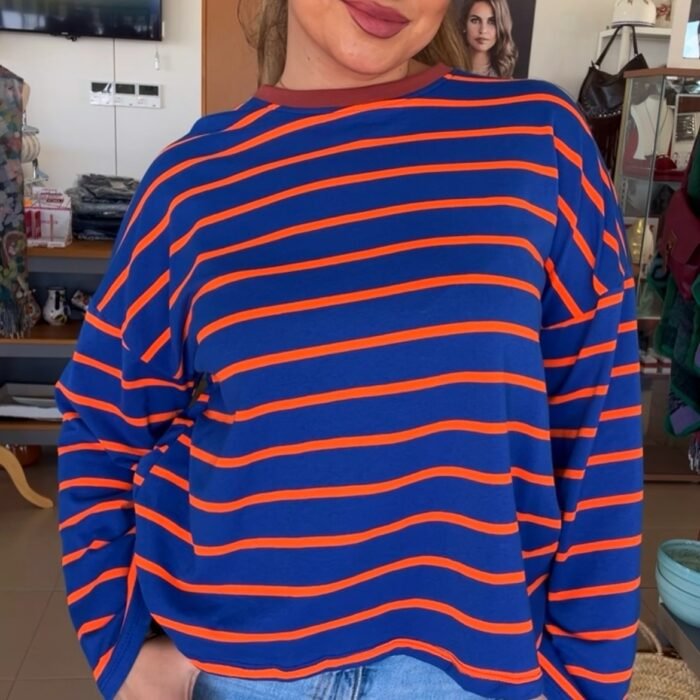 CAMISETA RRAYAS AZUL Y NARANJA